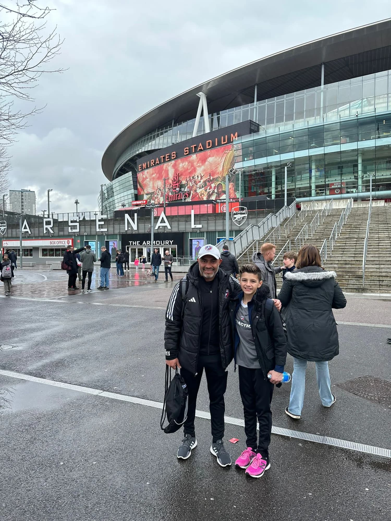 Members of the travel group outside the Liverpool stadium during the England visit