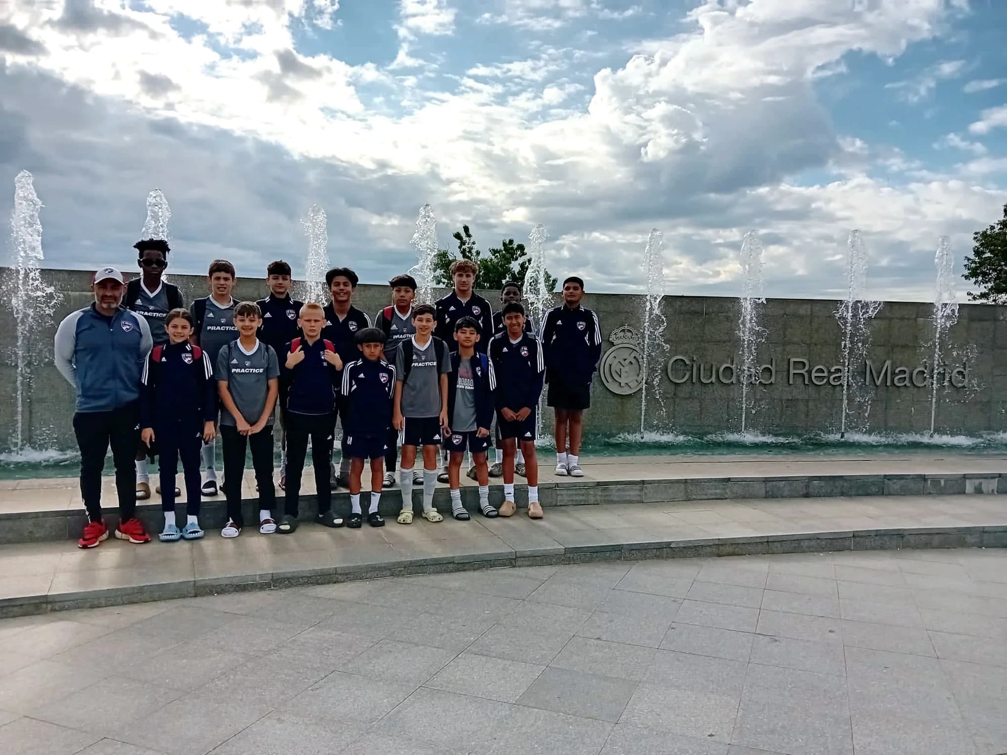 The team group together outdoors during the Spain 2024 trip